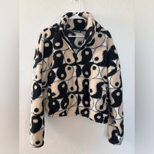 Yin-yang fleece sweater